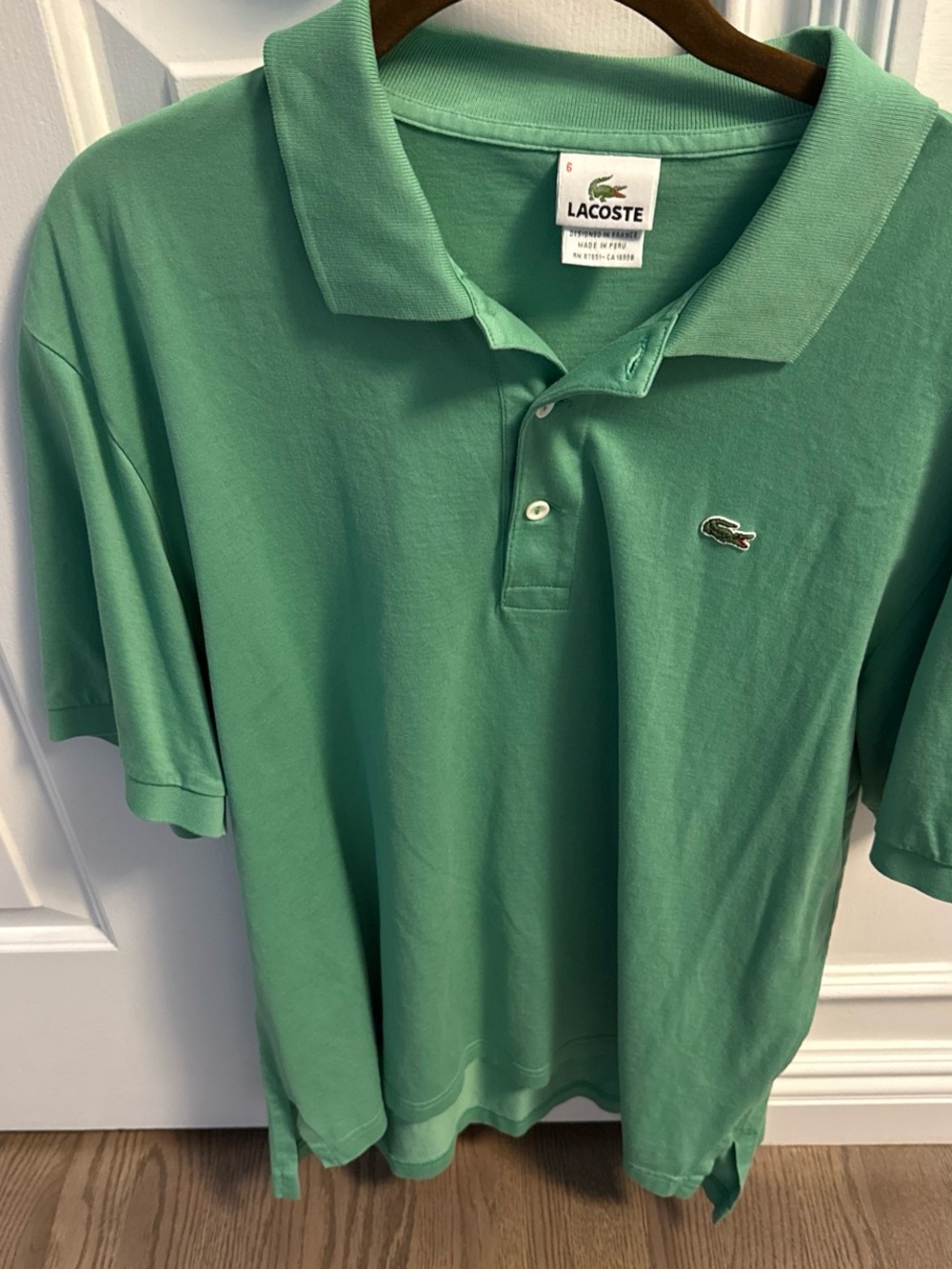 Men’s Lacoste Classic smooth cotton Polo in Kelly Green, runs small, size 6.